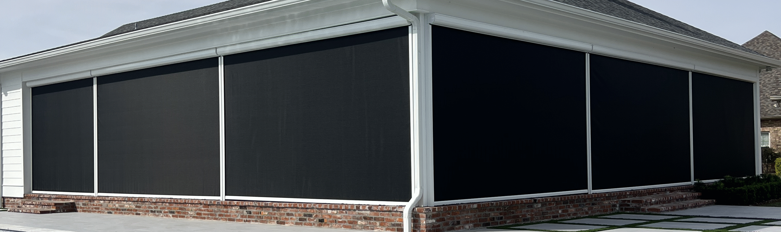 Custom-installed motorized shades by Southern Style Screens for effortless light control and modern outdoor living.