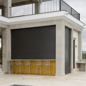 Durable motorized storm shutter closed during hurricane season